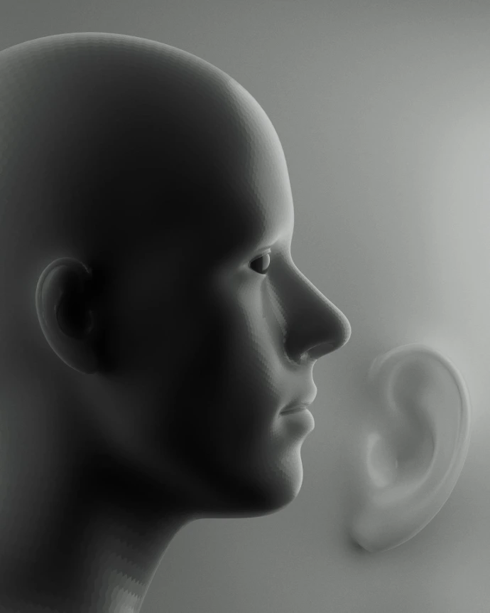 A human head profile with a disembodied ear